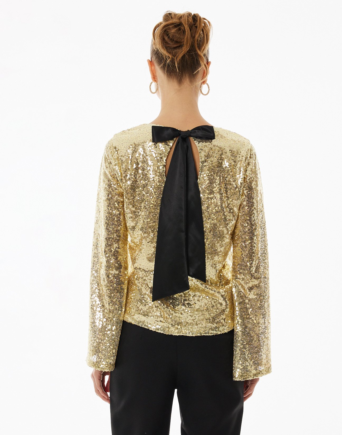 Sequinned blouse with tie