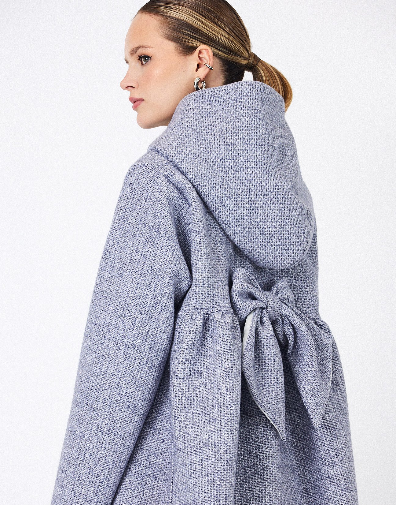 Coat with bow