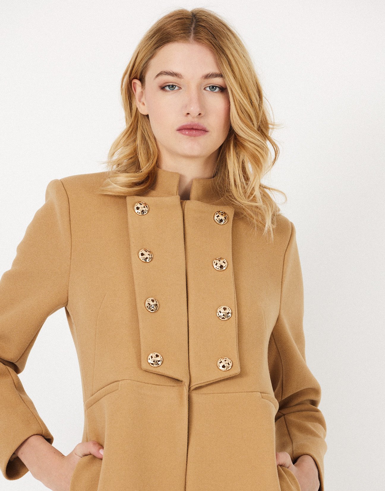 Coat with button