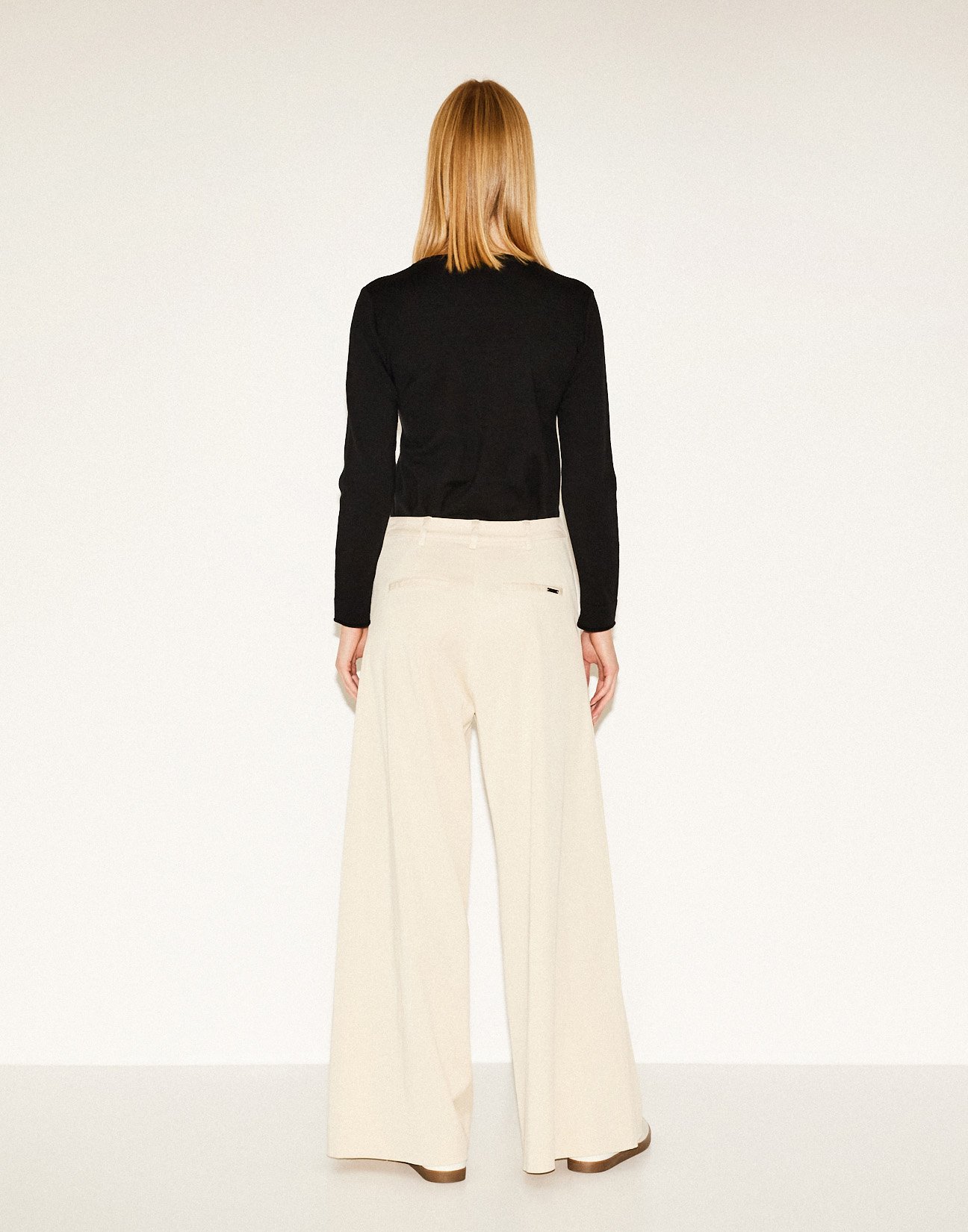 Trousers with double pleat