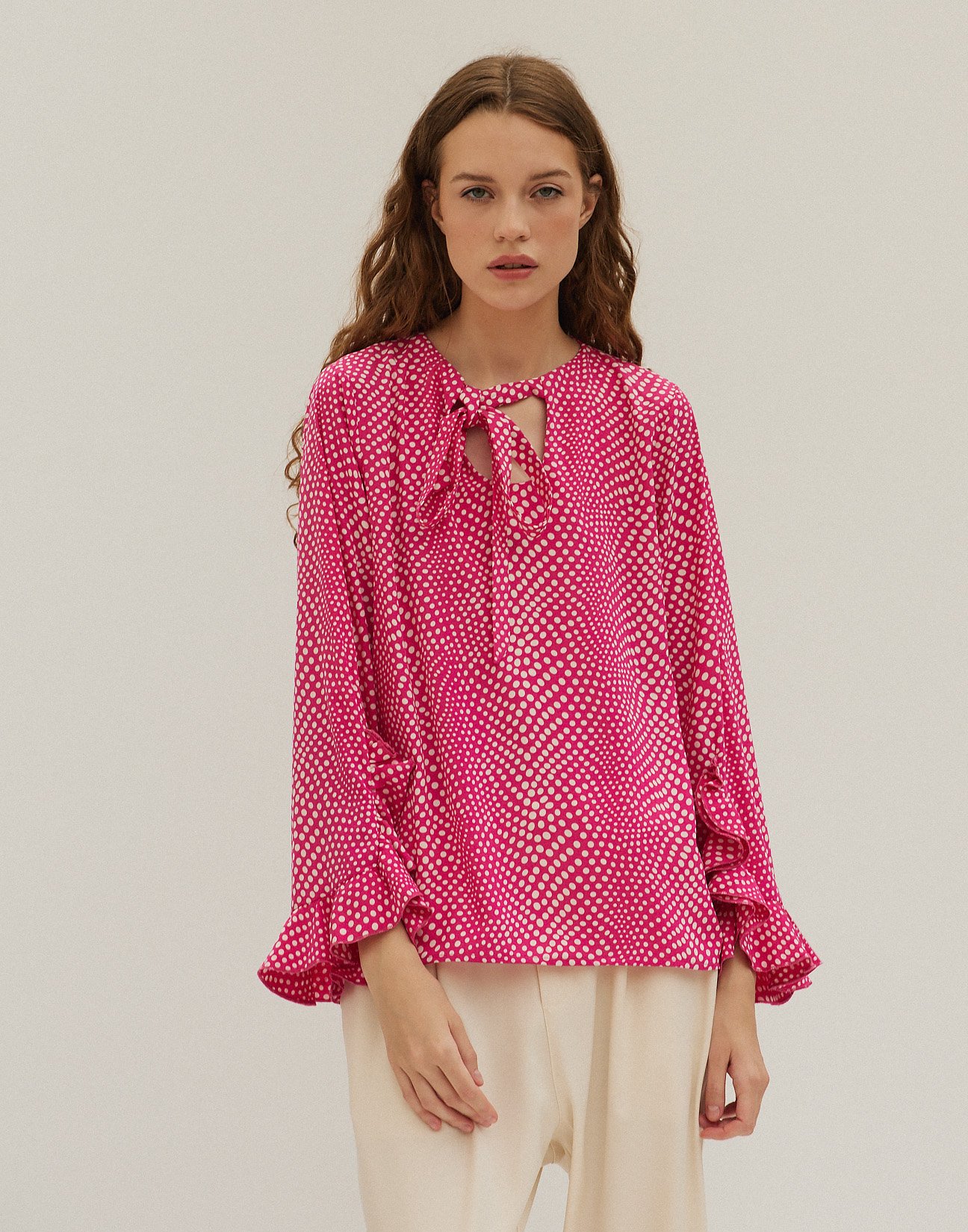 Ruffled polka dot blouse