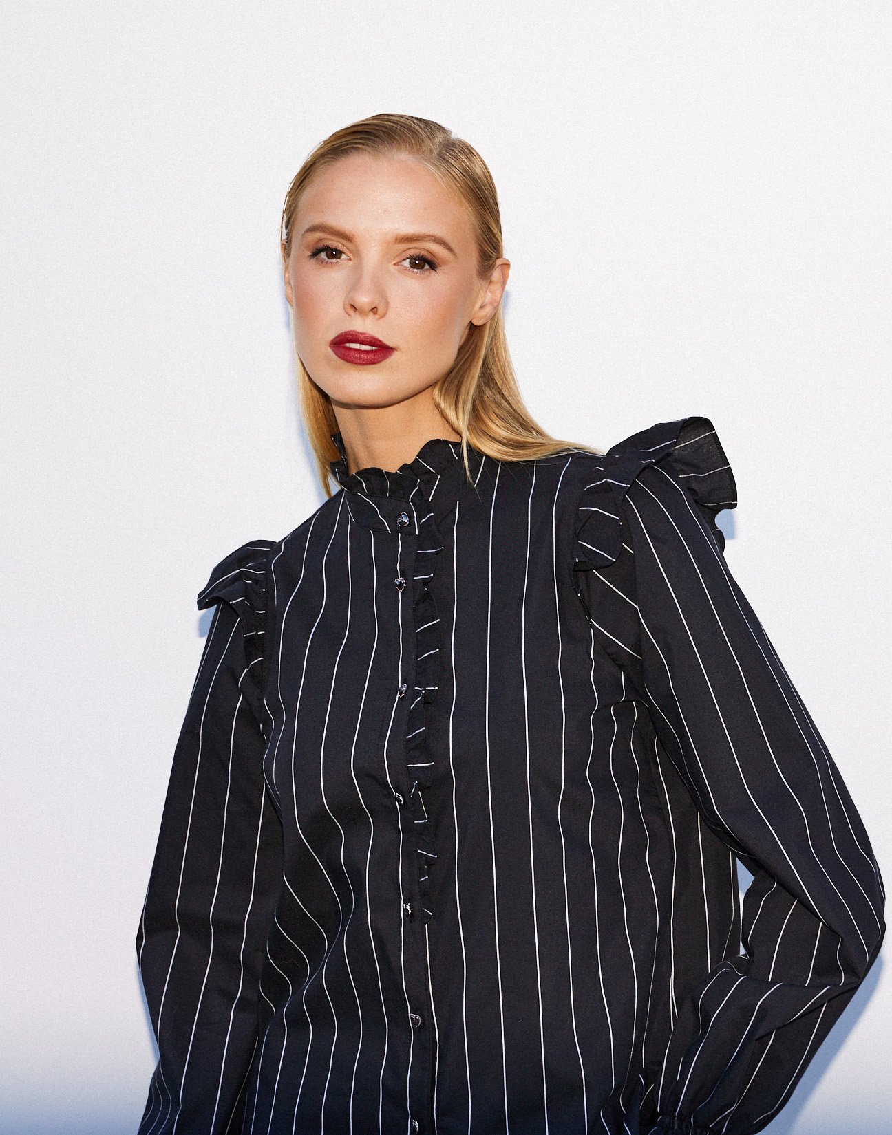 Striped shirt with ruffles