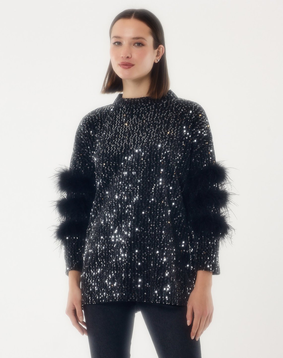 Sequinned  blouse with faux furs